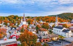 Vermont town with church steeples and fall foliage